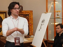 В Калининграде человек без кистей рук публично нарисовал портрет