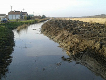 Под Зеленоградском расширили и  расчистили более 1,5 км русла реки Алейки