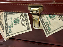 Чистый спрос россиян на наличную иностранную валюту в декабре 2014 года превысил 8 миллиардов долларов