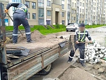 Зеленоградск проложил тротуары к дому частного застройщика