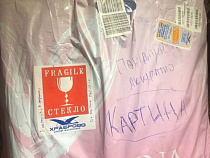 Грузчики в Питере и Калининграде устроили переписку на багаже пассажирки