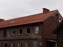 В Янтарном восстановили кровлю жилого дома, где год назад произошёл пожар