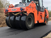 Дороги индустриального парка Храброво укладывают «Хамы» (фото)