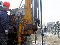 Болото с острова Октябрьский должны выдавить к июлю 2016 года